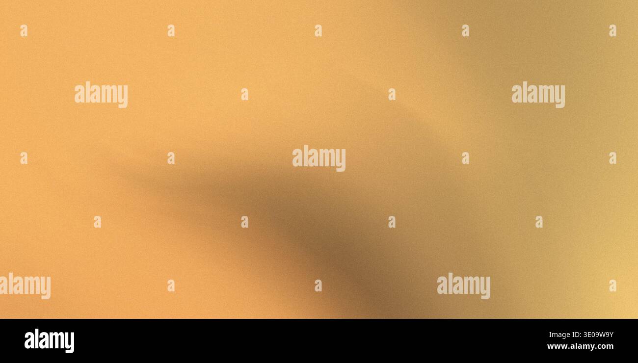 The image showcases a warm orange background with a smooth gradient effect, transitioning from light to dark, creating a visually appealing and engagi Stock Photo