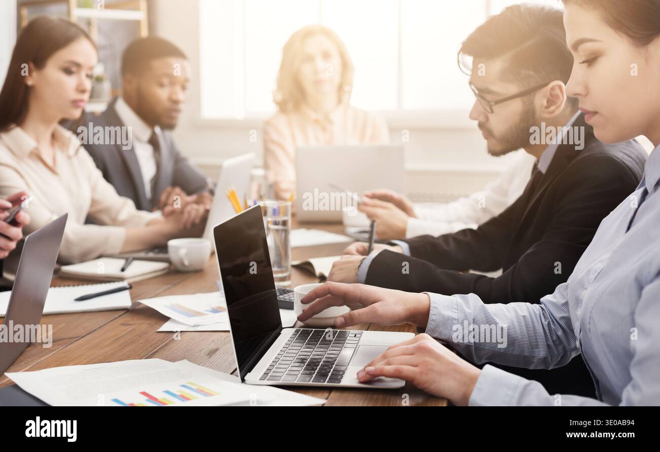 Programmers working in software developing company Stock Photo