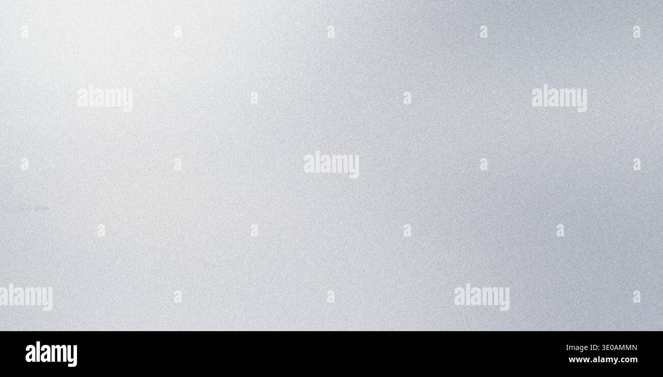 A close-up abstract background featuring a fine, grainy silver texture with a bright, soft light source emanating from the upper left corner, creating Stock Photo