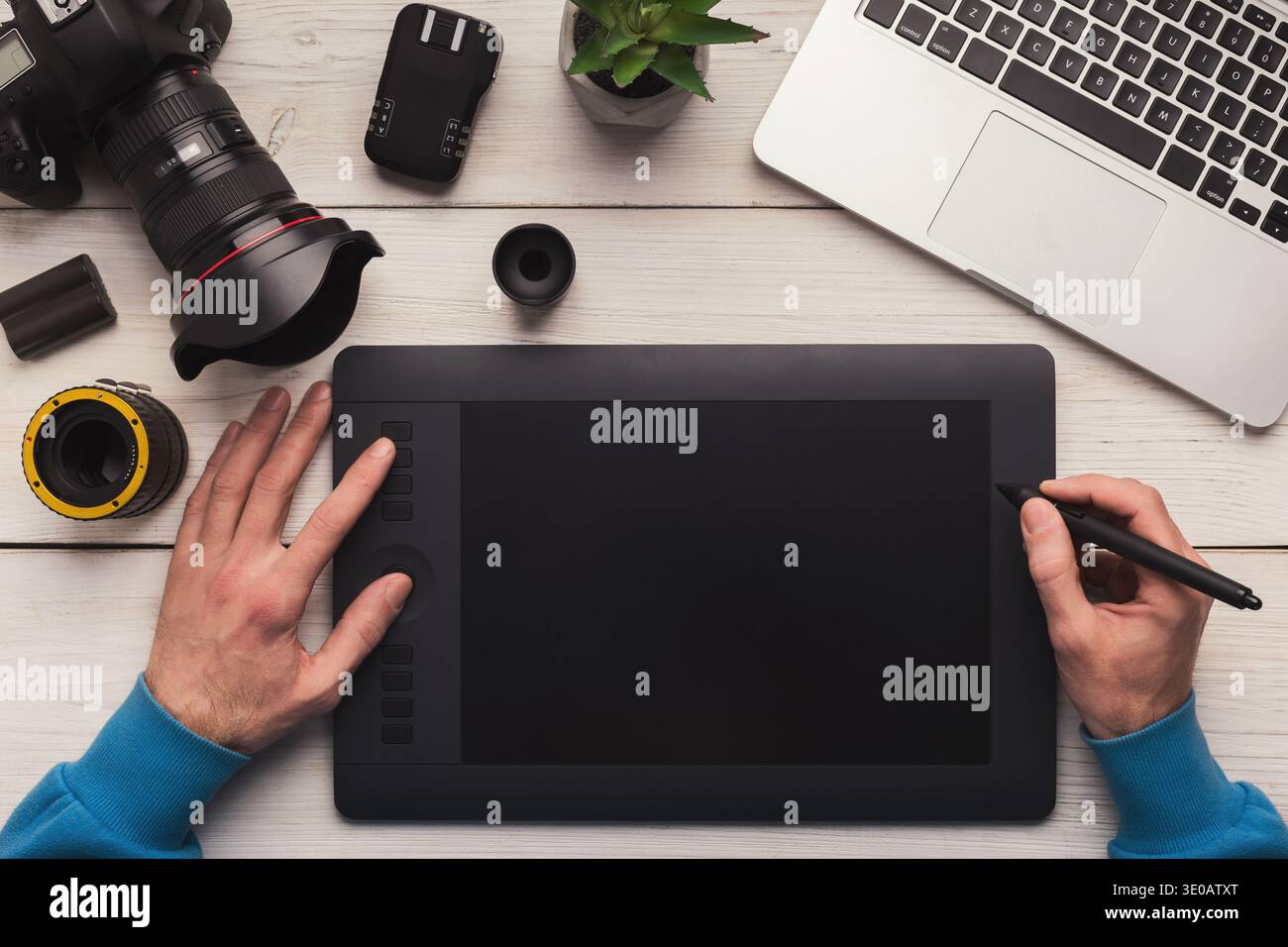 Designer hand working with graphic tablet Stock Photo