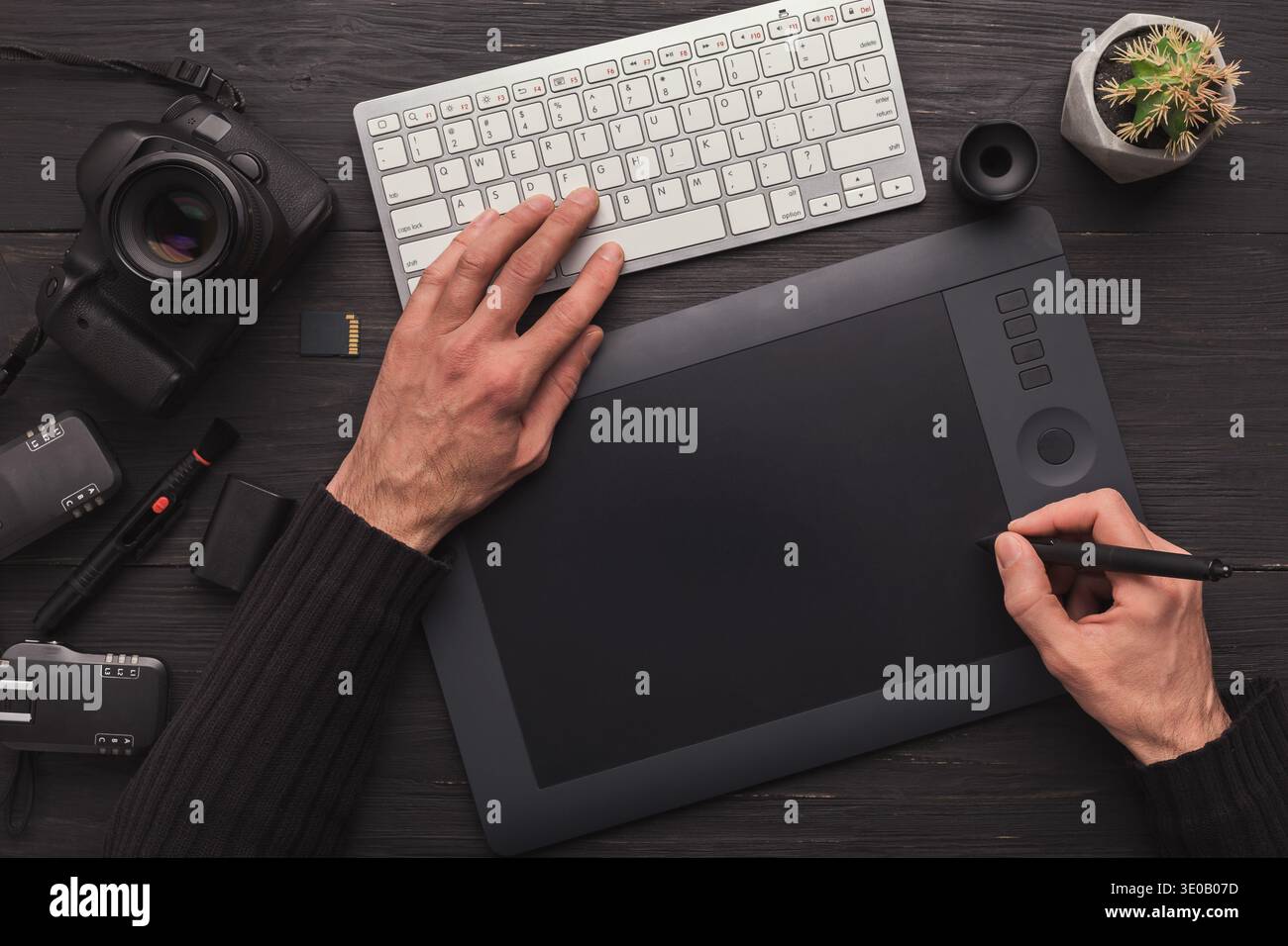 Designer hand with graphic tablet and keyboard Stock Photo