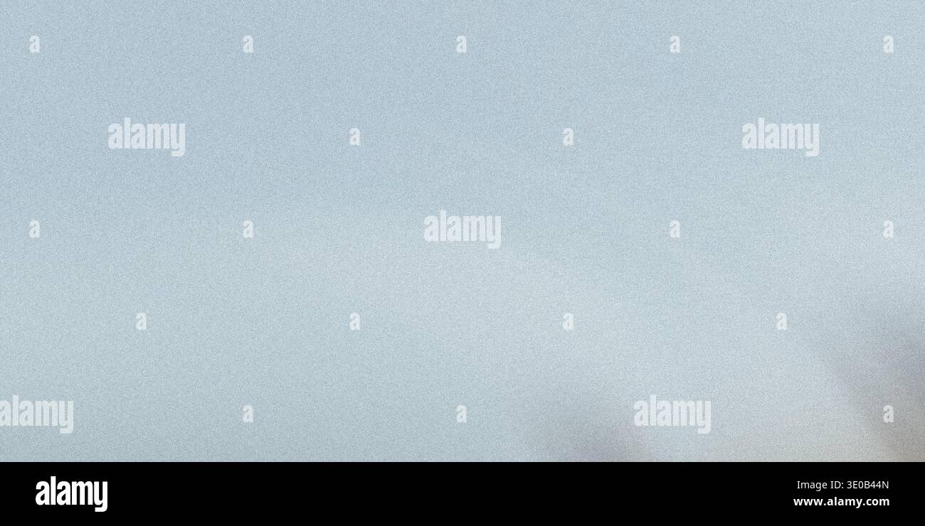 A subtle gray speckled texture creates a neutral and versatile background for various design applications Stock Photo