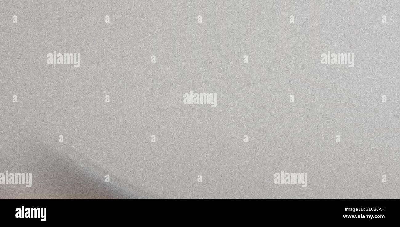 A subtle gray metallic texture creates a versatile and neutral background with a smooth, grainy surface Stock Photo