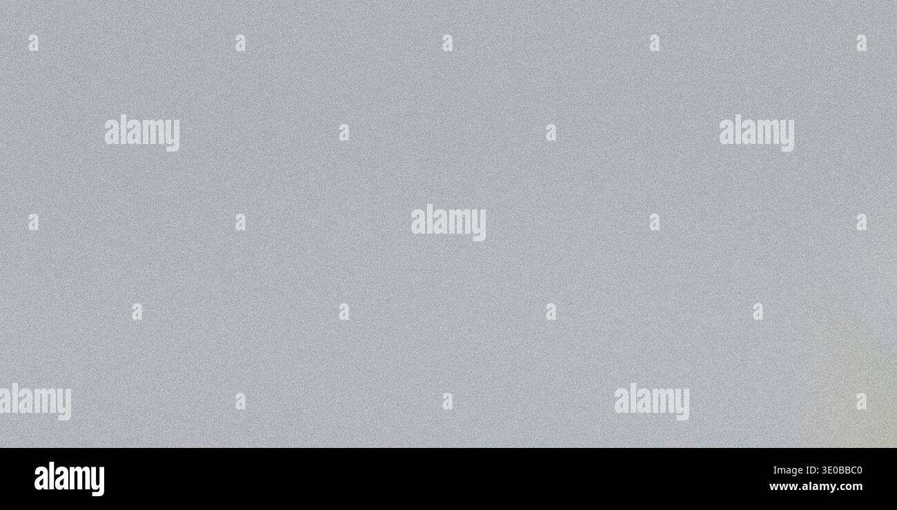 A grainy gray texture creates an abstract background with a subtle noise pattern Stock Photo