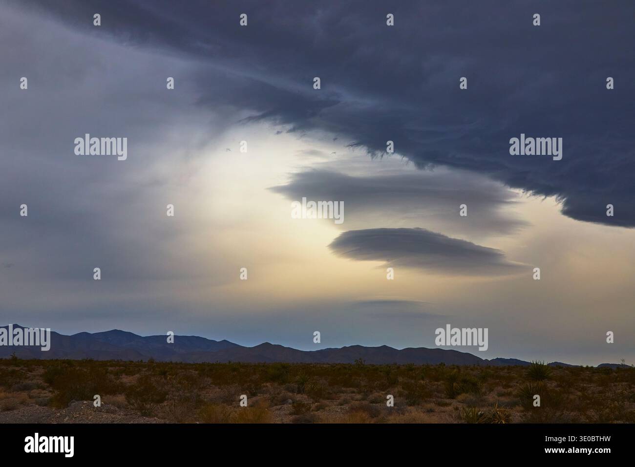 Storm Clouds and Dramatic Sky Over Nevada Desert Landscape Stock Photo