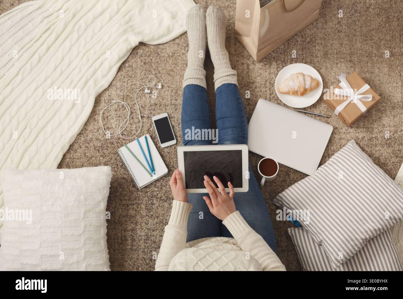 Woman using blank digital tablet Stock Photo