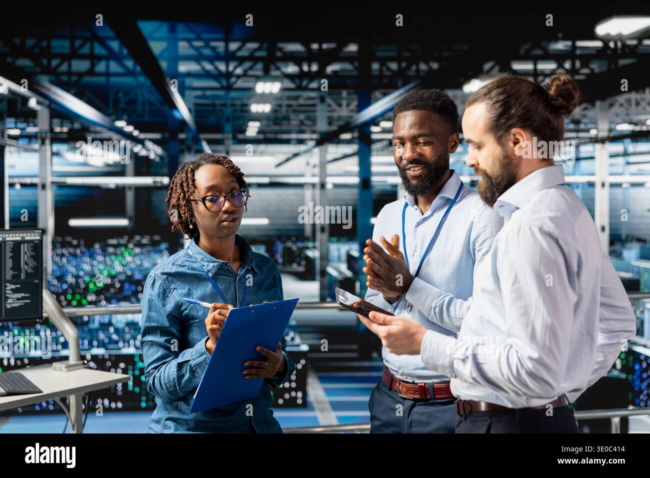 Server farm diverse coworkers doing infrastructure AI machine learning automatization. Data center computer scientists collaborating to maintain servers using artificial intelligence tools. Stock Photo