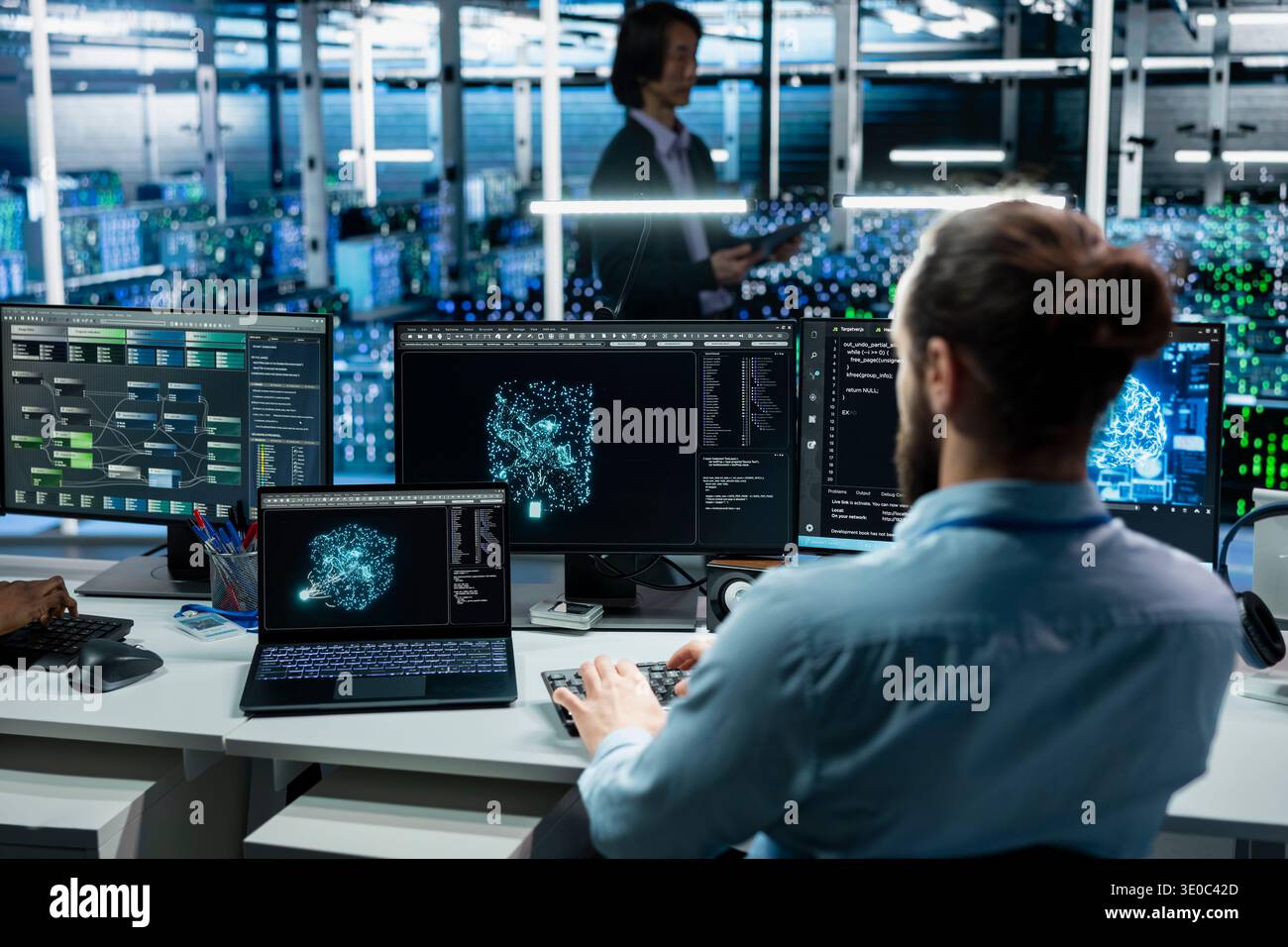 Programmer working in data center with hardware managing AI training datasets. IT worker overseeing machine learning tech in server farm supporting scalable infrastructure for AI apps Stock Photo
