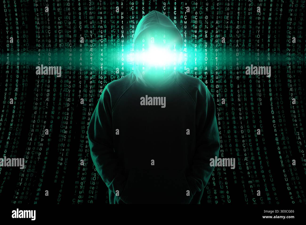 Cybercriminal in hood against programming code. Digital safety Stock Photo