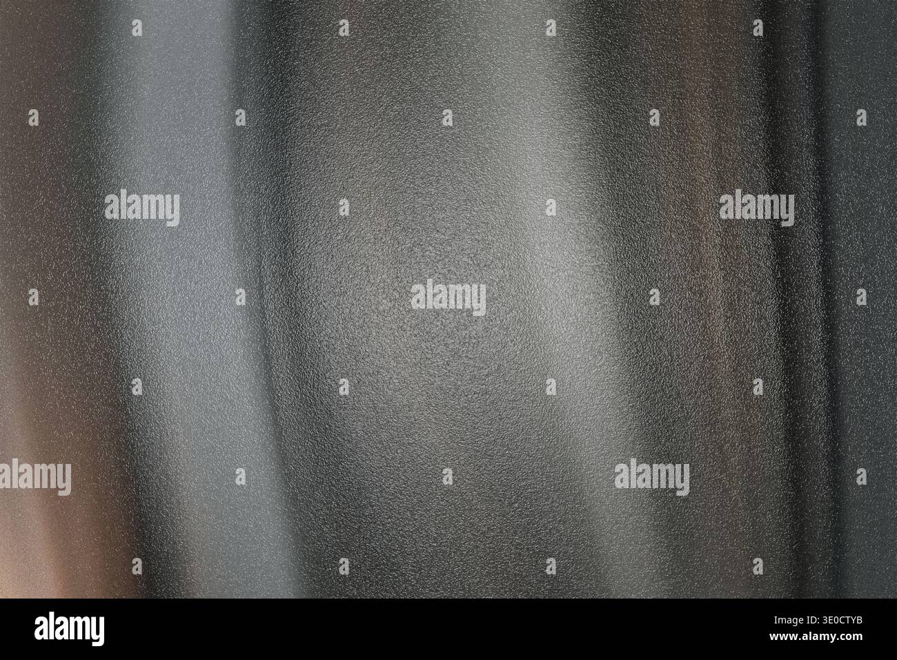 An image featuring a blurred abstract background with vertical lines predominantly in shades of grey and brown. The texture appears smooth with subtle Stock Photo