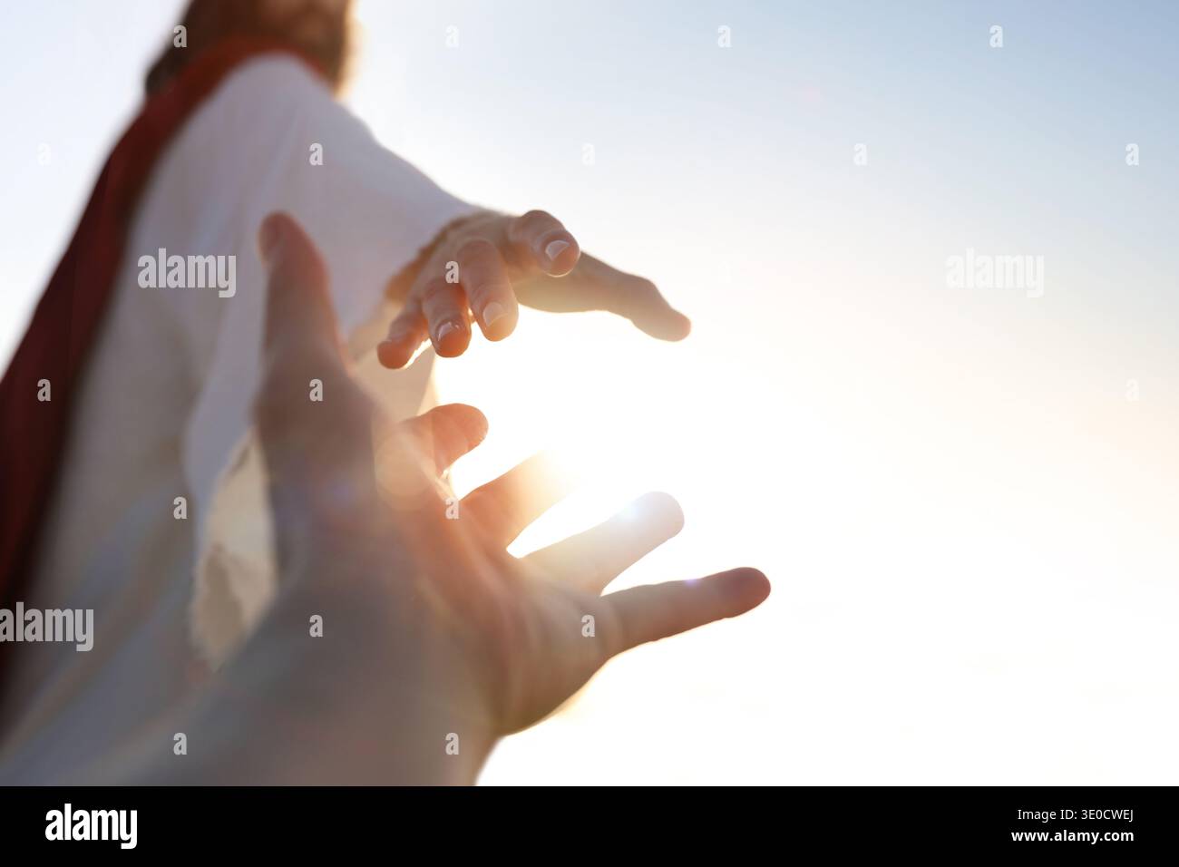 A desperate Christian hand reaching out to the hand of Jesus Christ ...