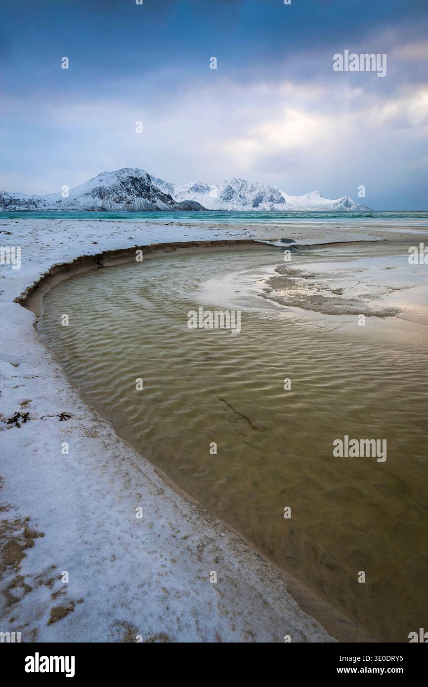 View of the Haukland beach during a storm in winter. Lofoten Island, Norway. Stock Photo