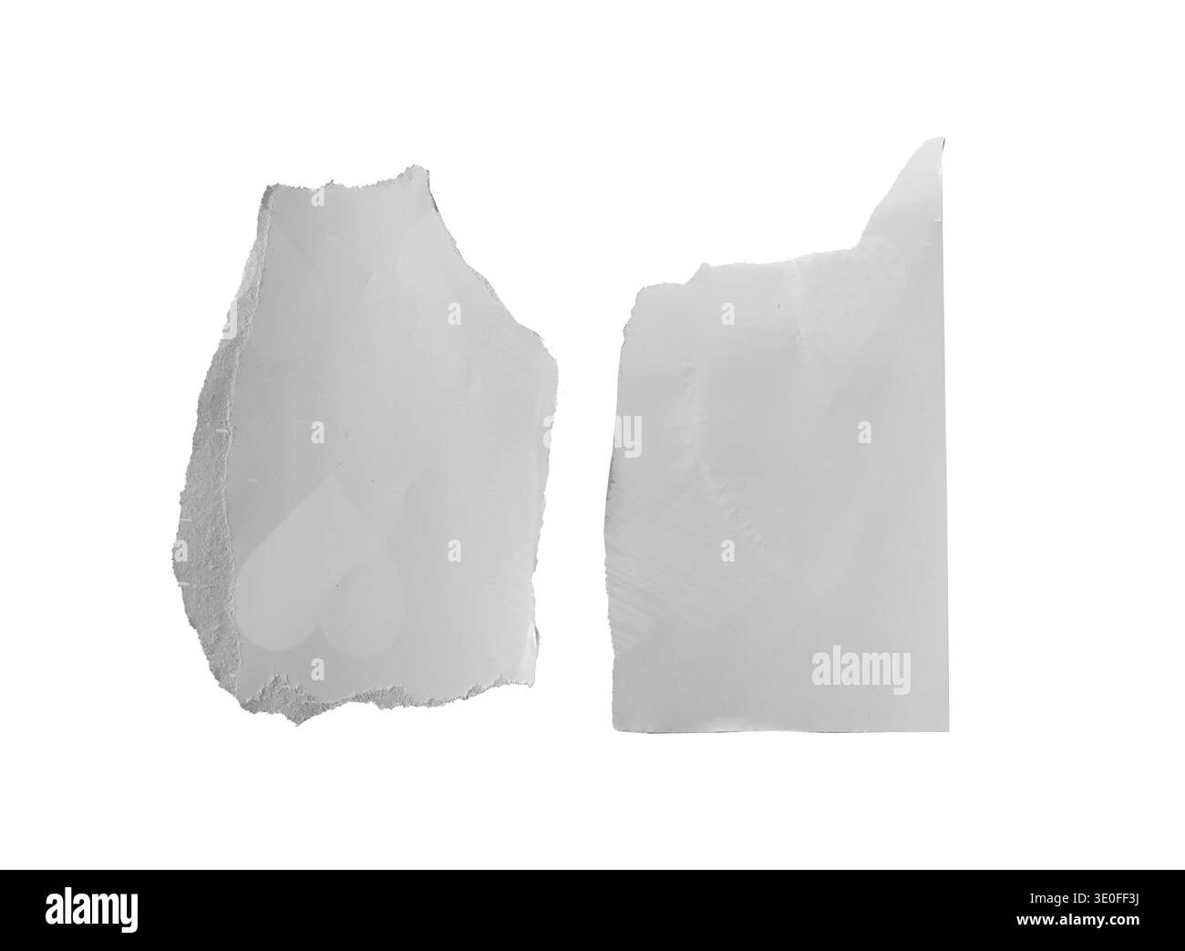 torn paper remnants isolated on white background. Soft matte surfaces with uneven ripped contours Stock Photo