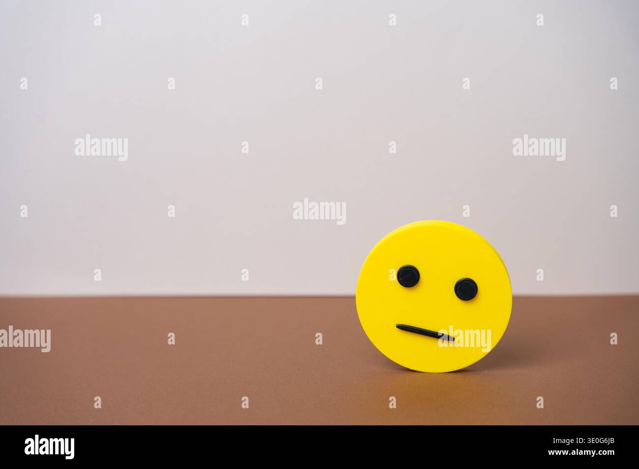 Yellow neutral faced emoji representing dissatisfaction, indifference ...
