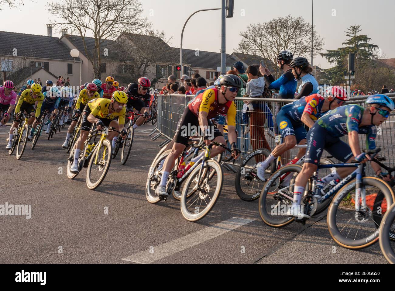 The first stage of the Paris - Nice cycling stage race. Peloton with ...