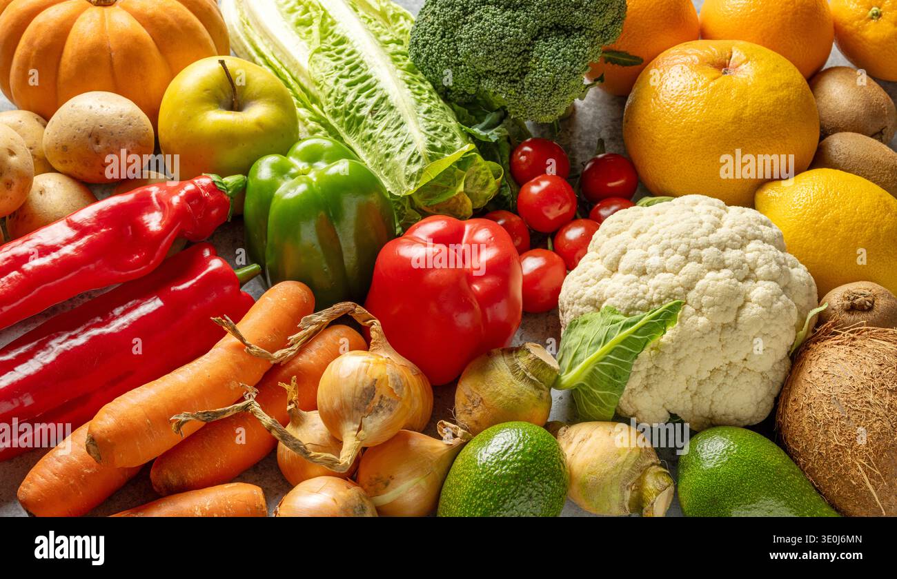 various fresh raw vegetables and fruits background Stock Photo