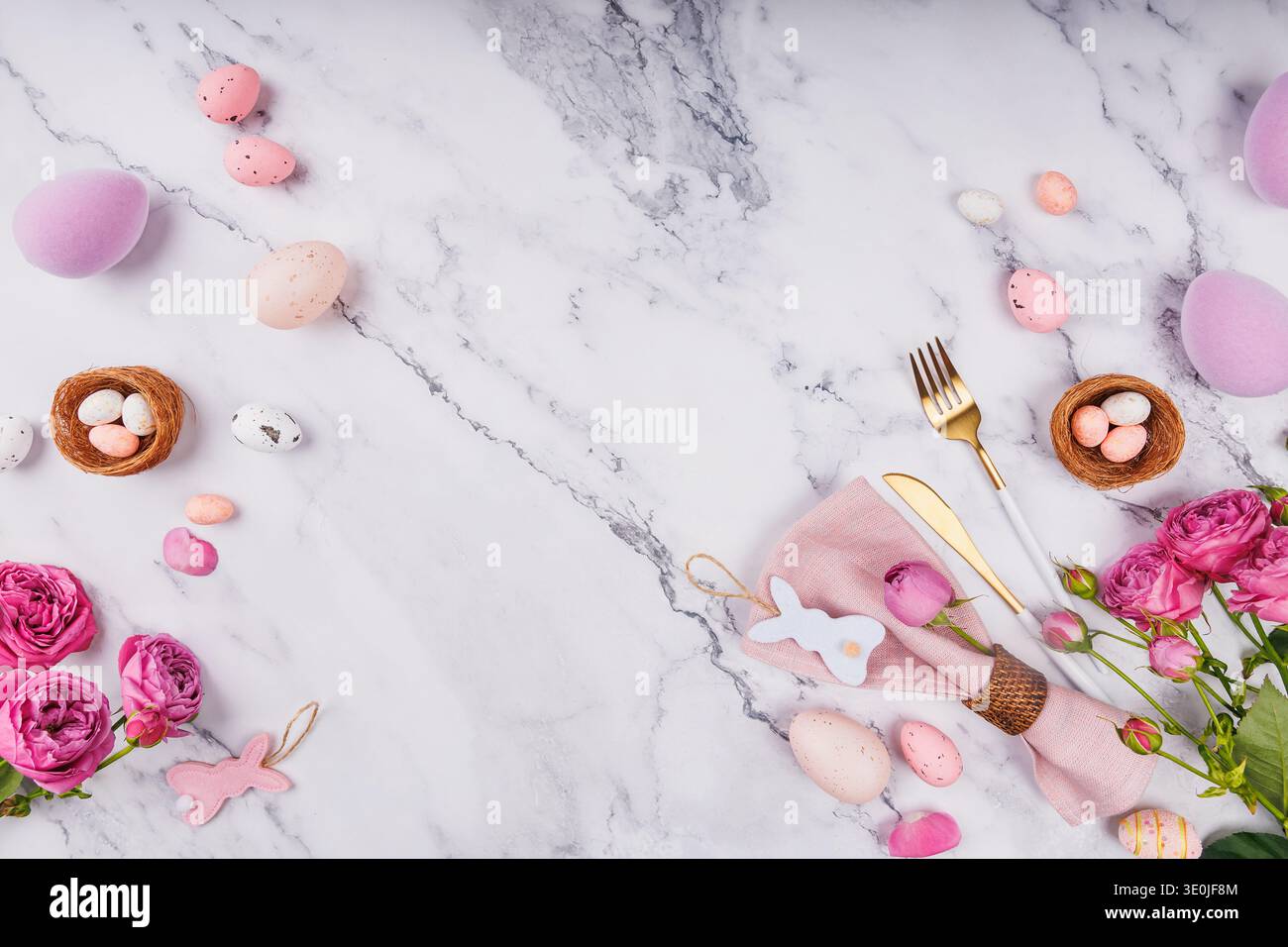Festive Easter Flat Lay with Roses and Cutlery Stock Photo