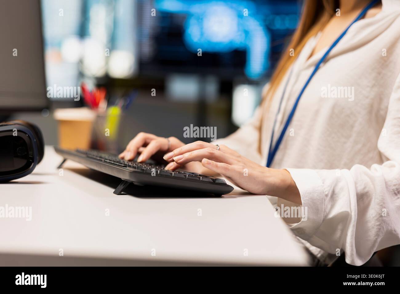 Close up of engineer writing code, developing machine learning APIs. IT expert typing on keyboard in office, troubleshooting software errors using artificial intelligence tech Stock Photo