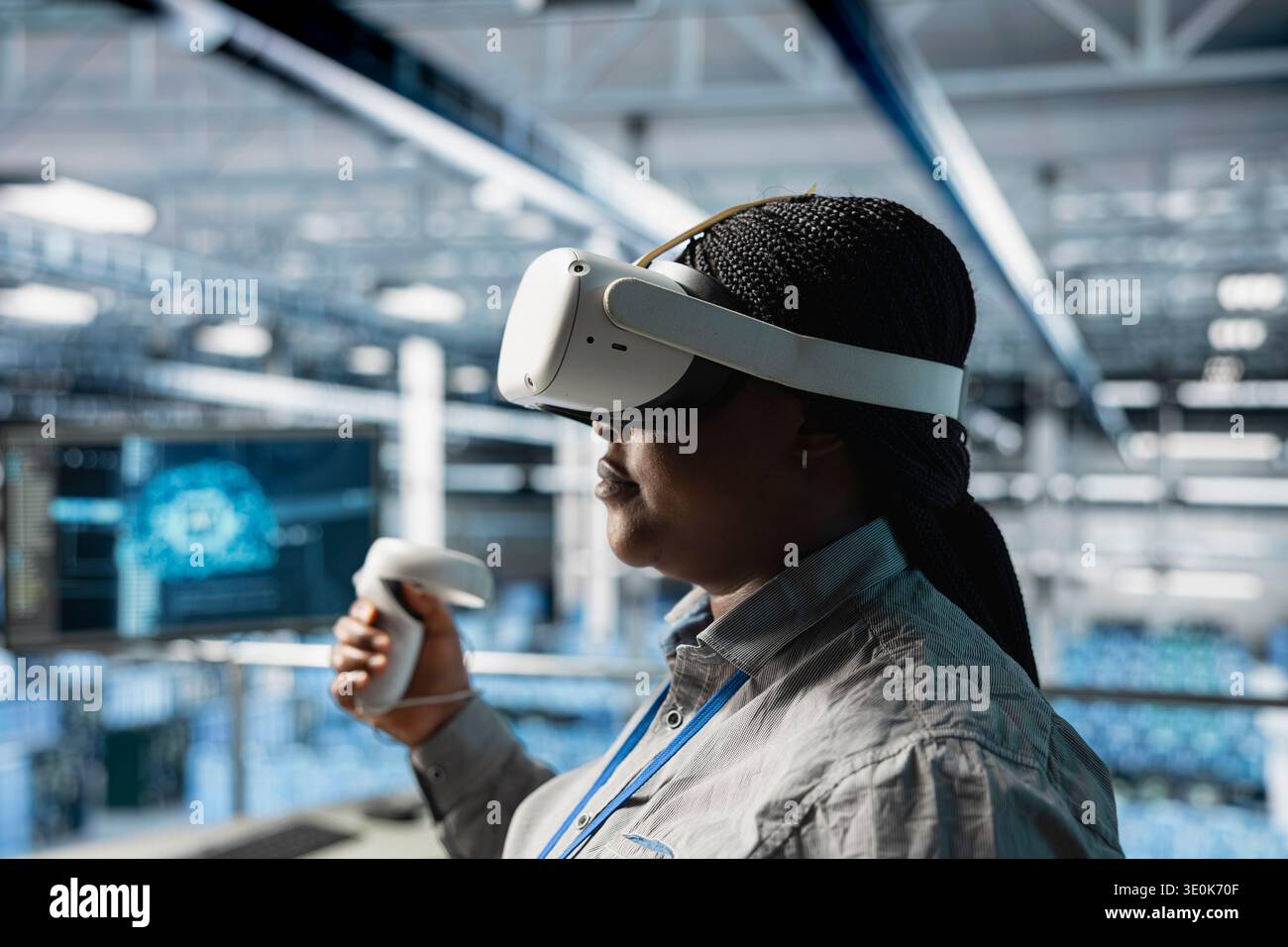 Close up of server room female technician using VR equipment, checking AI analytics. Woman in data center worker adjusting machine learning parameters in code using virtual reality technology Stock Photo