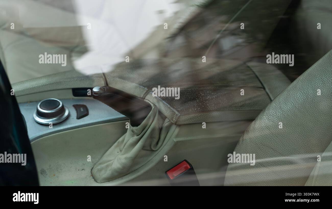 Car interior with manual parking brake lever and center console Stock Photo
