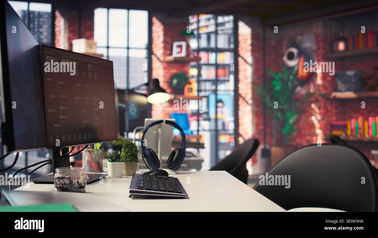 Office desktop setup includes monitors displaying terminal interfaces and AI systems. The self learning model showcases deep learning innovations and modern computing technologies. Stock Photo