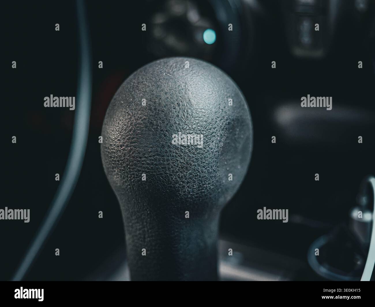 Black gear shift knob close-up in car interior dashboard automotive still life Stock Photo
