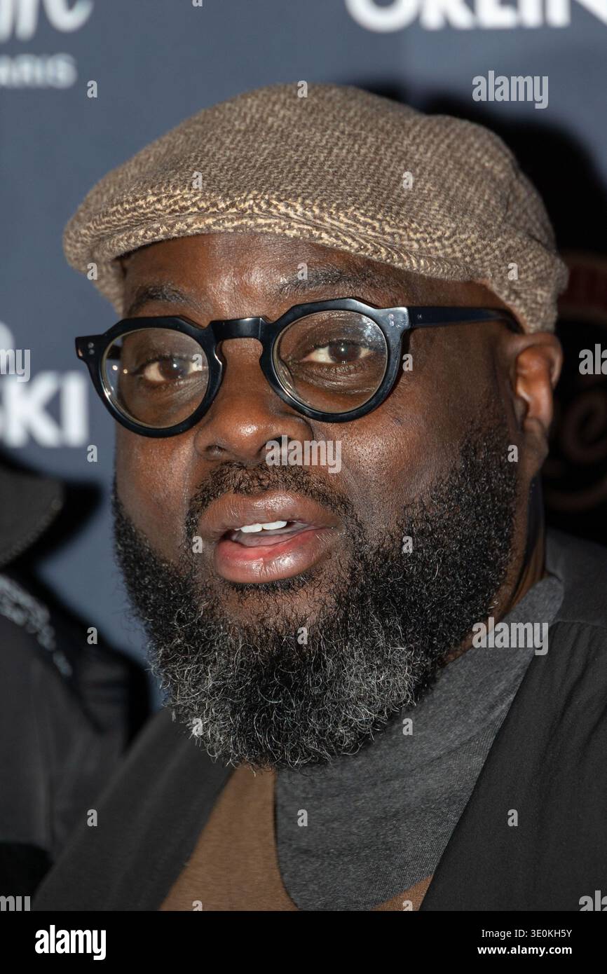 Issa Doumbia attends the unveiling of Richard Orlinski wax figure at ...
