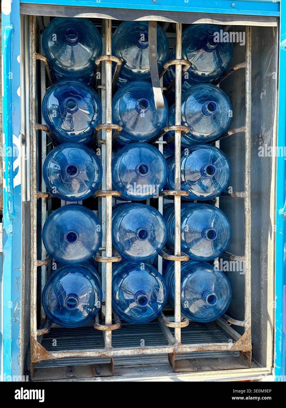 Potable water delivery truck supplying households & stores in Mérida, Yucatán, Mexico Stock Photo