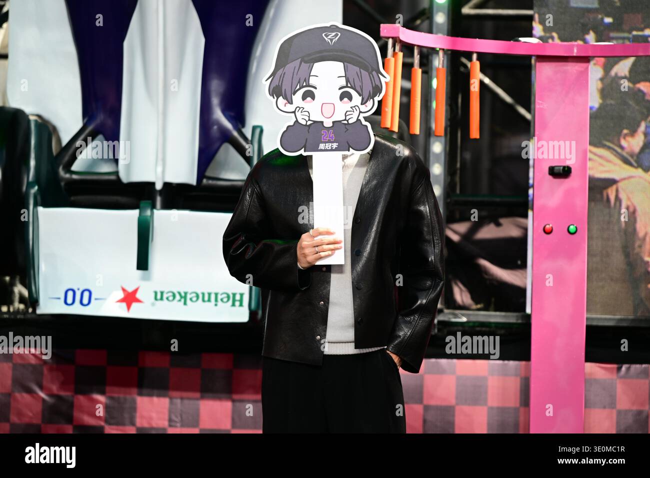 Chinese racing driver Zhou Guanyu interacts with fans during a meet-and ...