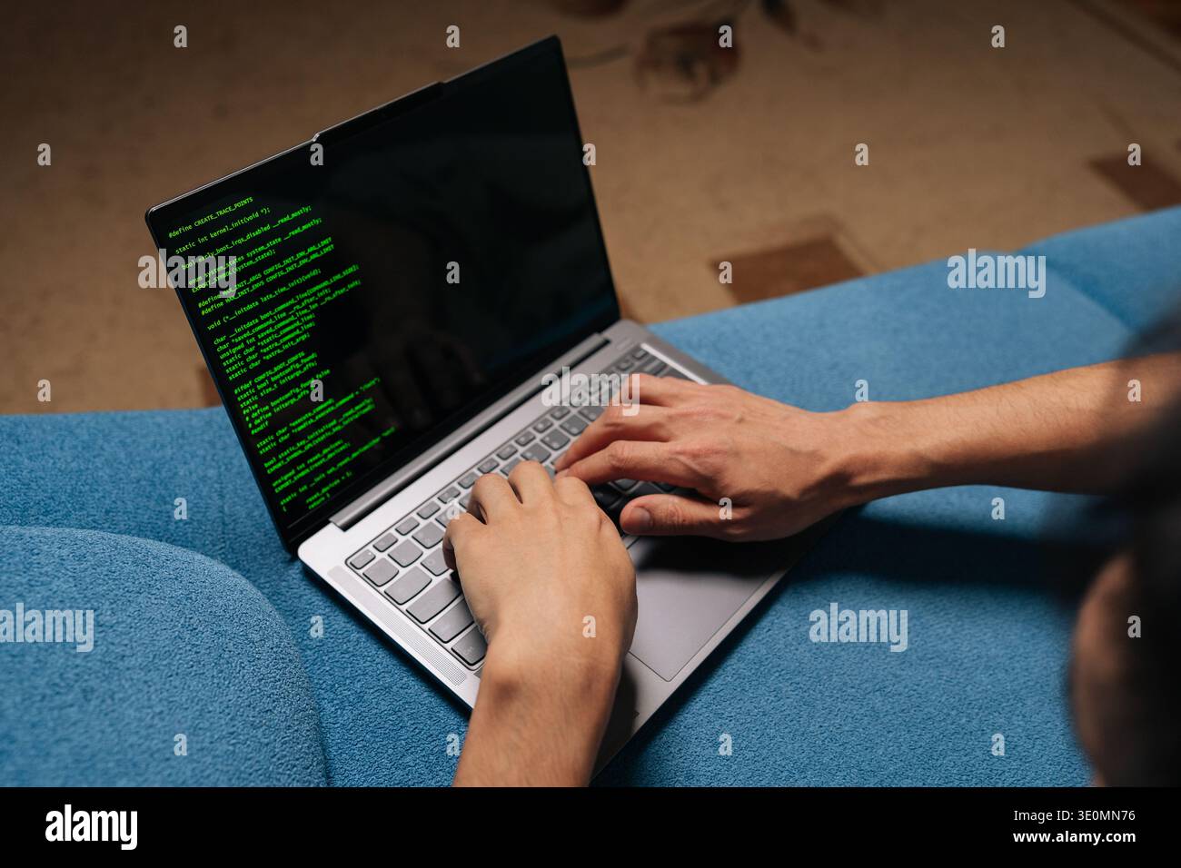 Close-up of programmer developer coding software program script on laptop display, typing keyboard for remote work at home, creating innovative Stock Photo