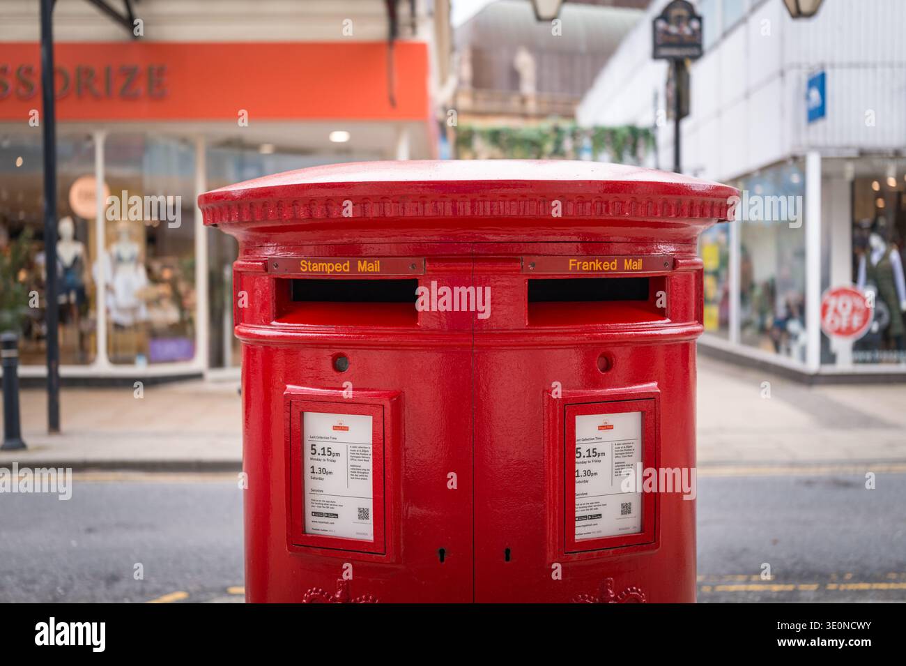 Two slotted Red Post Box for Stamped Mail and for Franked Mail in the centre of Harrogate in North Yorkshire. Stock Photo