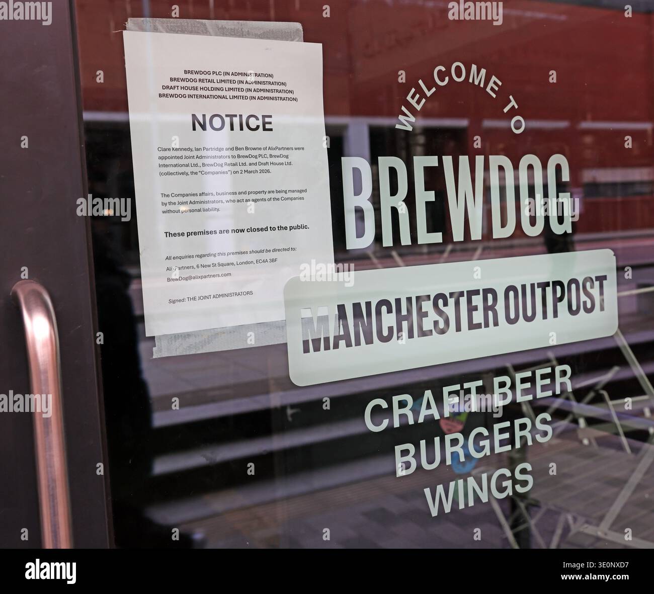 Administration notice on the door of BrewDog Manchester Outpost on Oxford Road, Manchester, stating the premises are closed to the public. Stock Photo