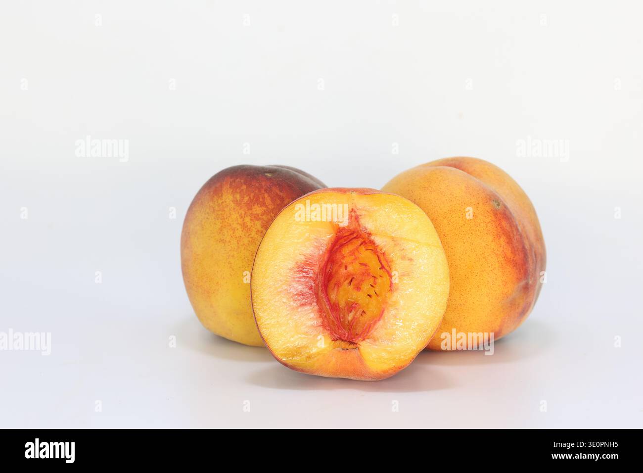 ripe peaches isolated on white Stock Photo