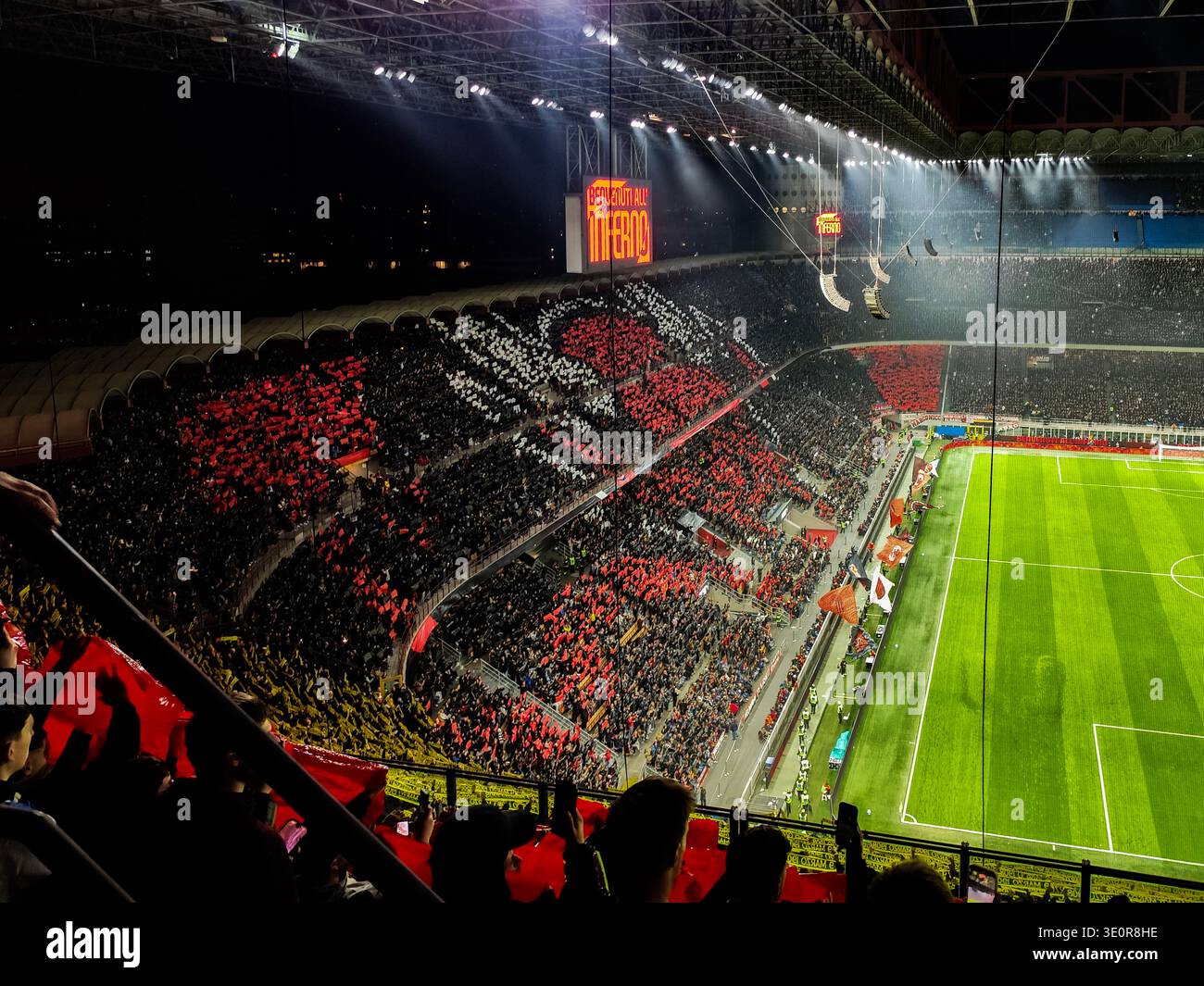 San Siro Stadium, Milan, Italy – March 8, 2026: General view inside the stadium with fans displaying red and black tifo during the Derby Stock Photo