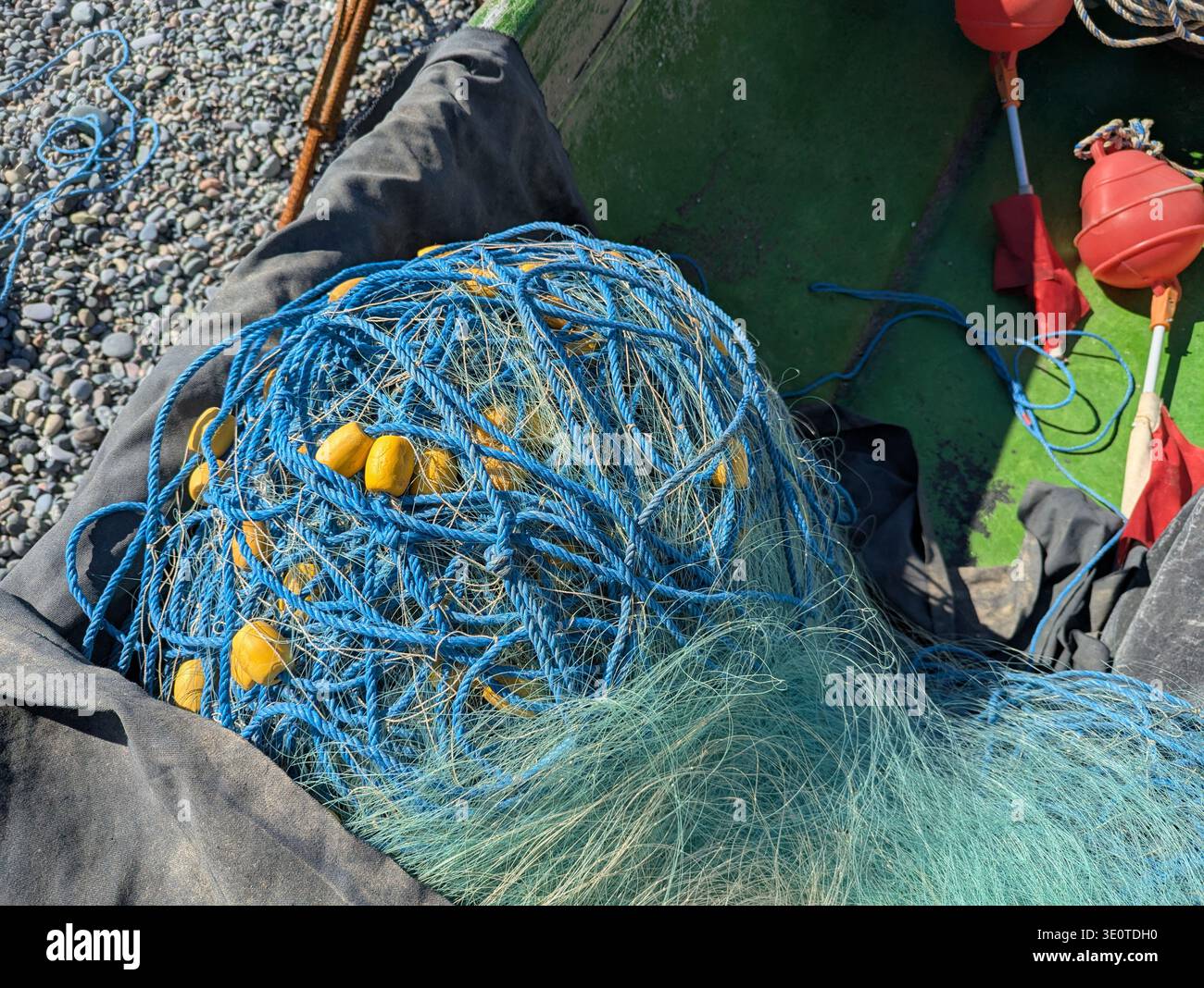 black sea fishing nets Fishing Nets and Buoys Inside Small Boat on Black Sea Beach in Kobuleti  Georgia Stock Photo