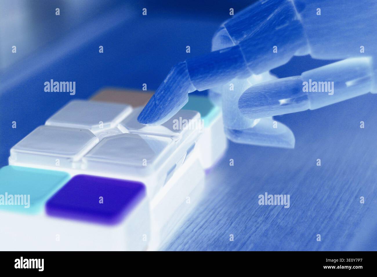 Robot hand pressing button, concept of artificial intelligence . Stock Photo