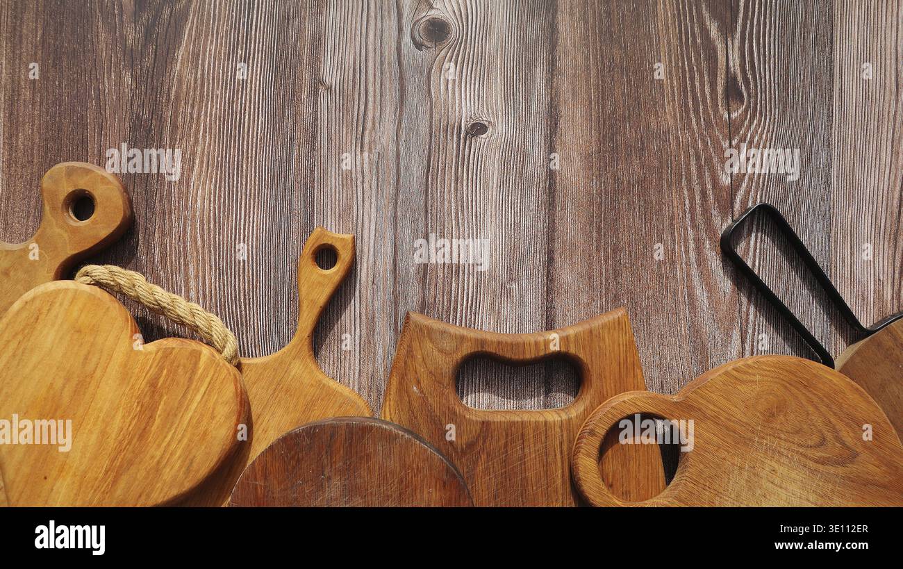 Empty cutting boards on wooden background Stock Photo