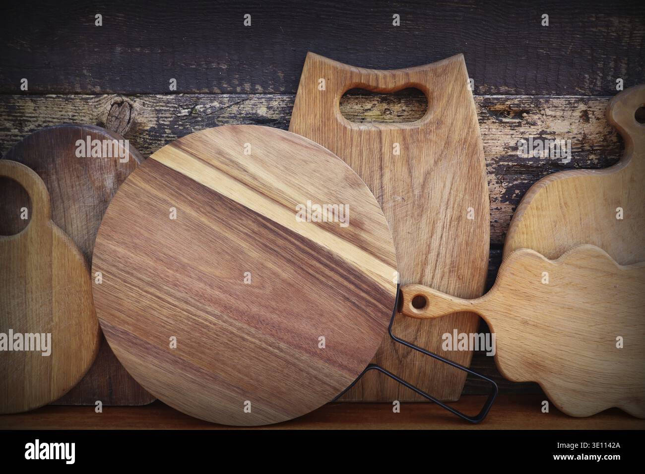 Empty cutting boards on wooden background Stock Photo