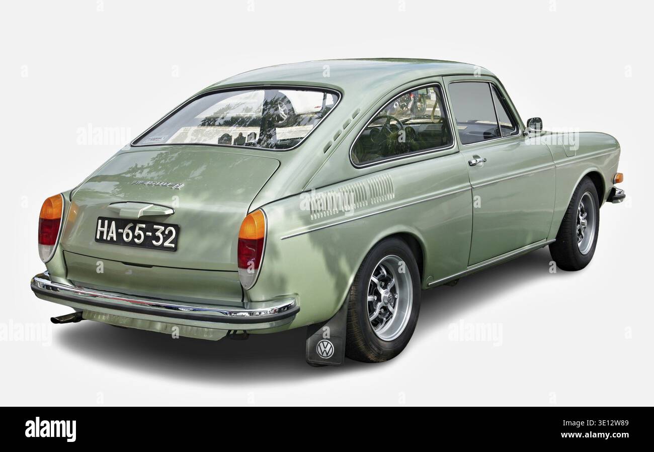 Volkswagen Type 3 Fastback vintage green car on a white background