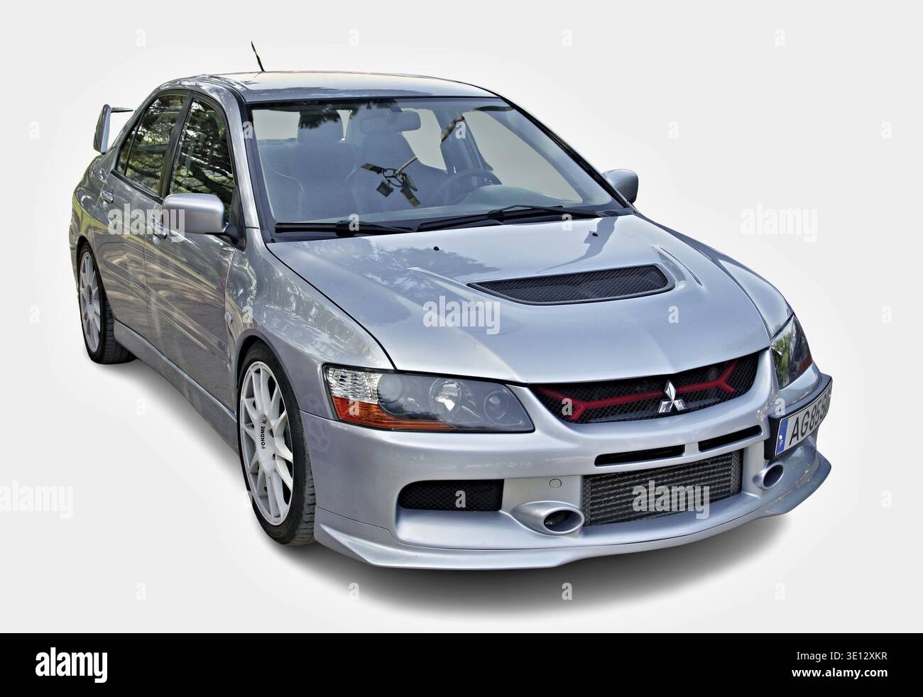 Lancer Sliver Silver Mitsubishi Lancer Evolution posing in a studio environment ...