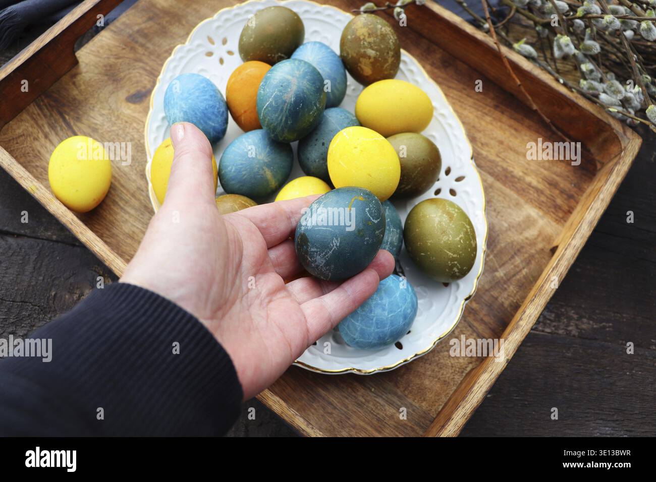 Stylish Easter table setting. Natural egg, modern plate. Easter table decoration Stock Photo