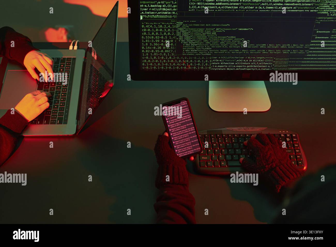 Anonymous people using computer and programming to break code. Cyber security threat. Internet and network security. Access to private information. An Stock Photo