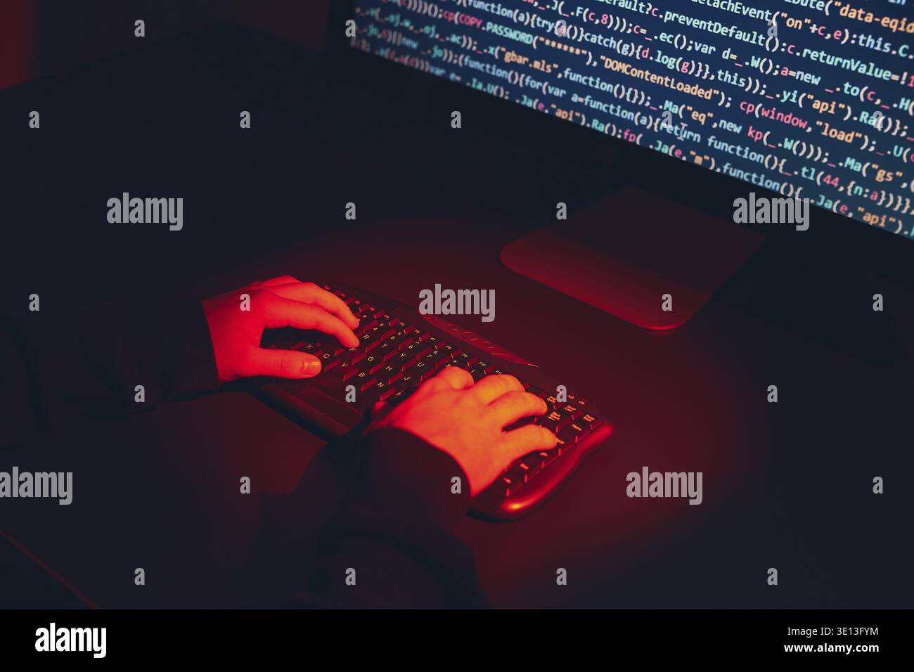 Man using computer and programming to break code. Cyber security threat. Internet and network security. Stealing private information. Person using tec Stock Photo