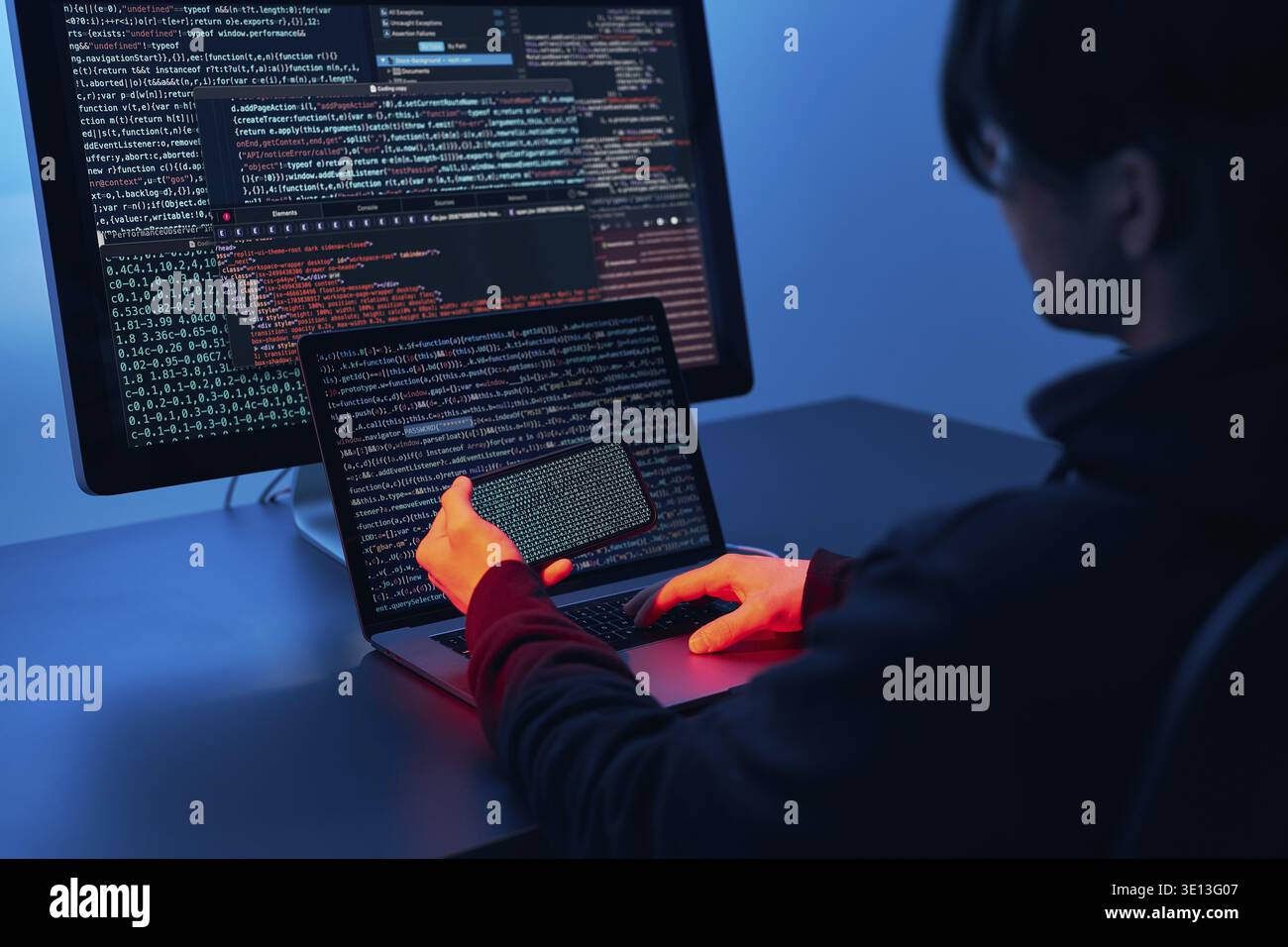 Man using computer and programming to break code. Cyber security threat. Internet and network security. Stealing private information. Person using tec Stock Photo