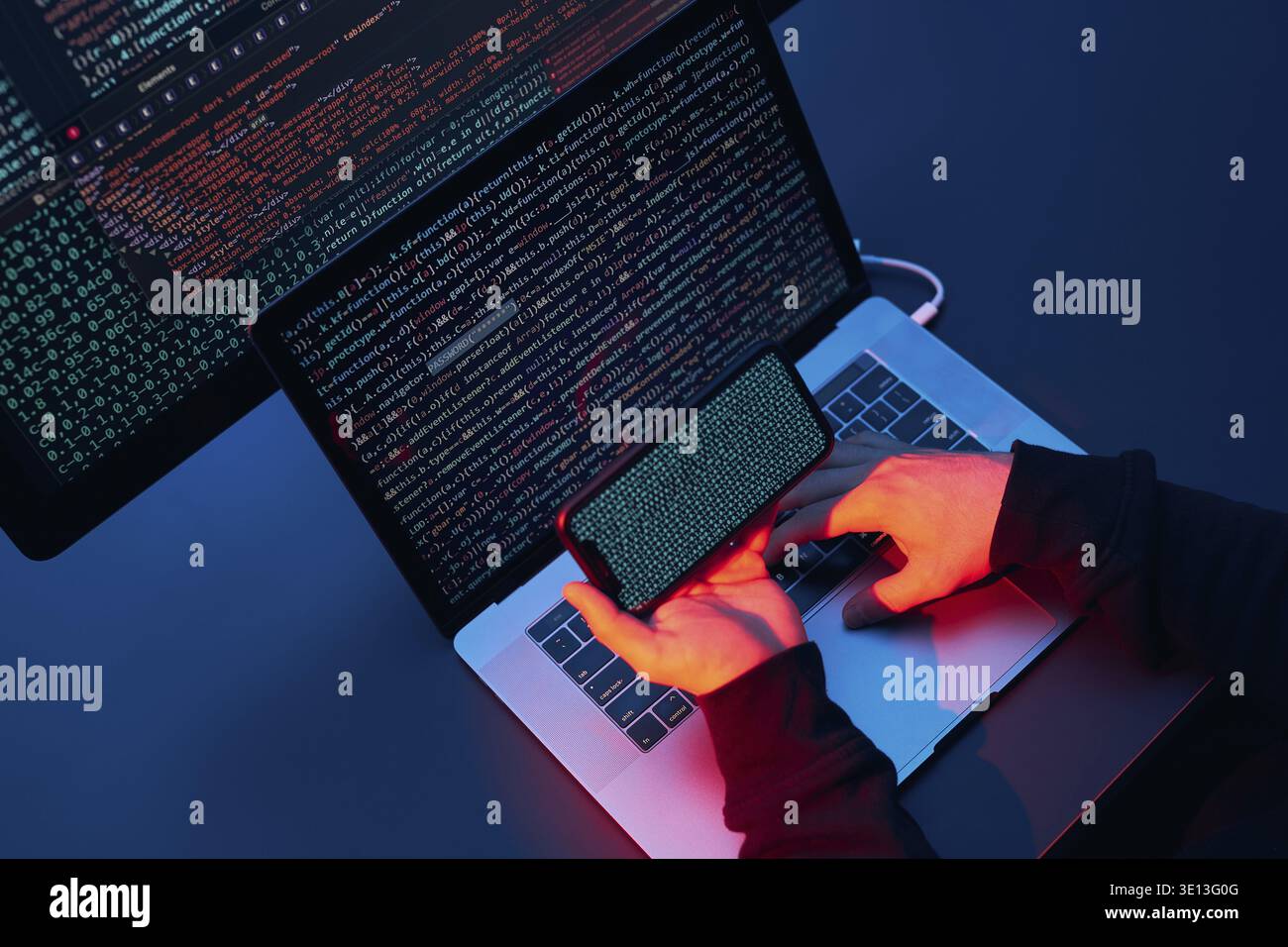 Man using computer and programming to break code. Cyber security threat. Internet and network security. Stealing private information. Person using tec Stock Photo