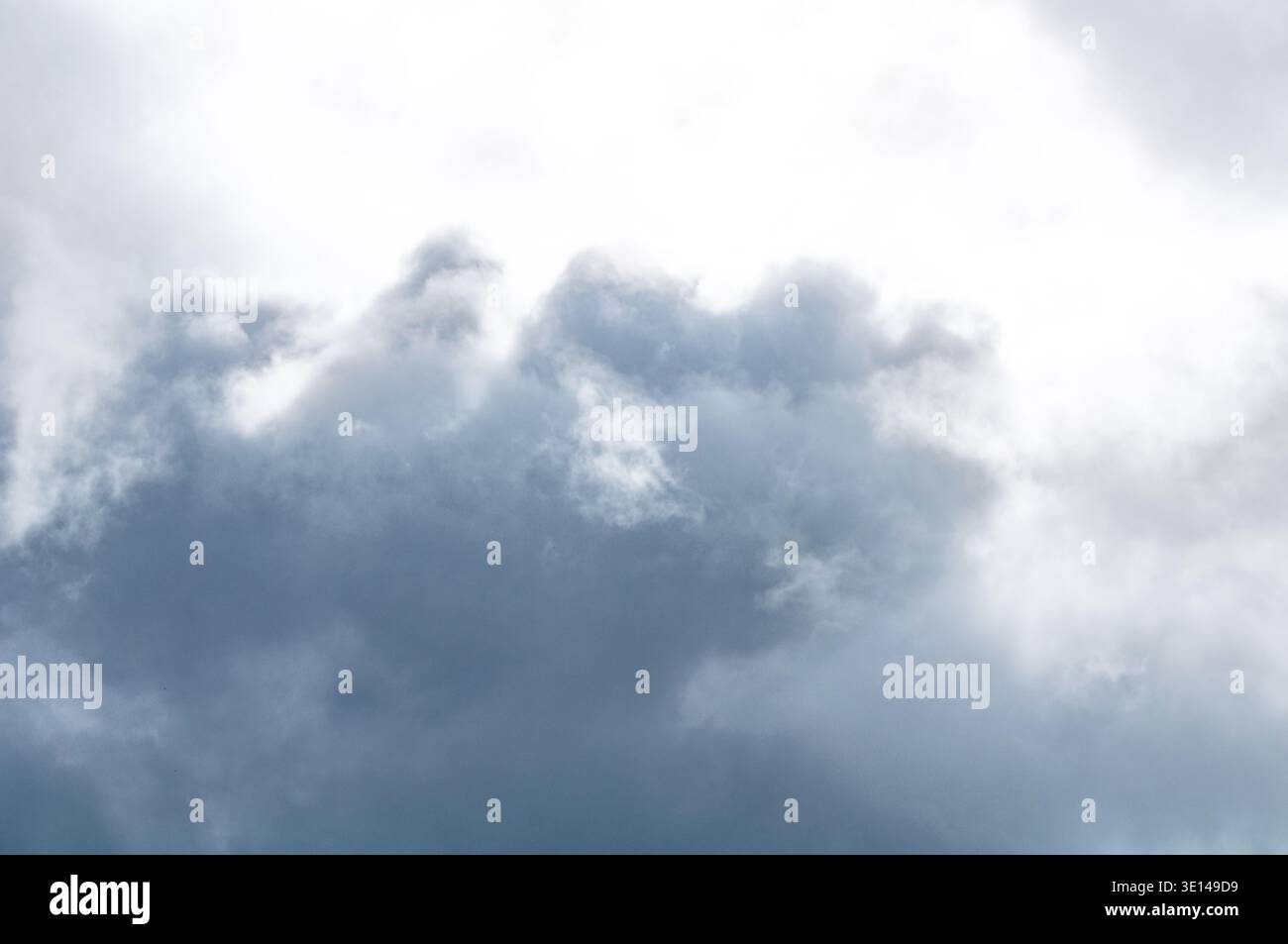 Soft cloudy sky with light overcast clouds and subtle blue tones Stock Photo
