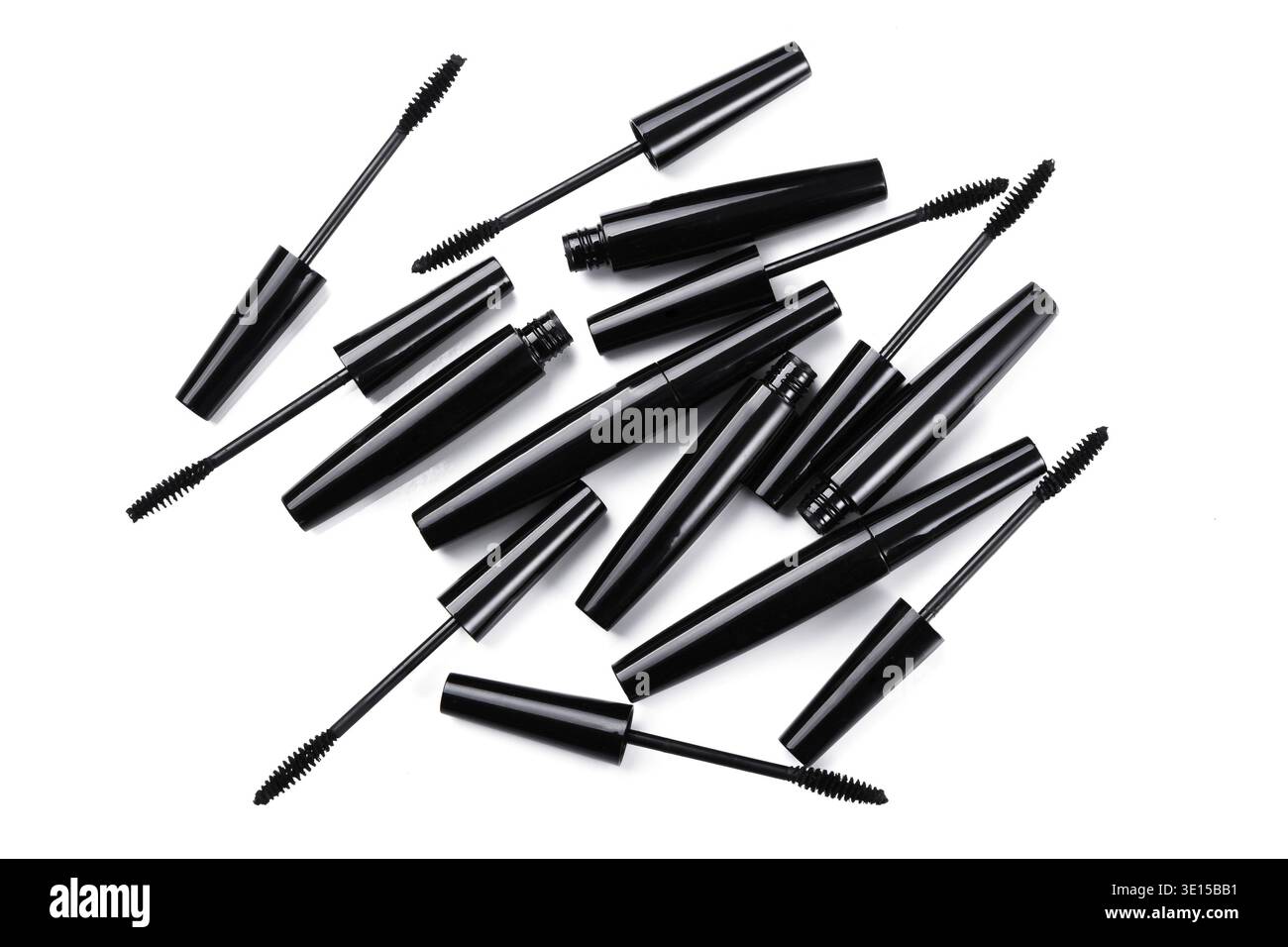 Mascara brushes and containers on white background Stock Photo
