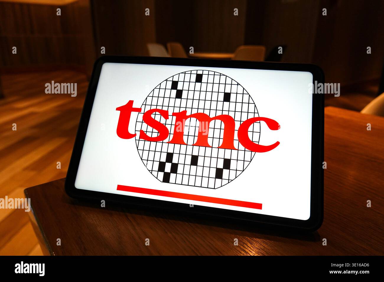 In this photo illustration, the logo of TSMC (Taiwan Semiconductor ...