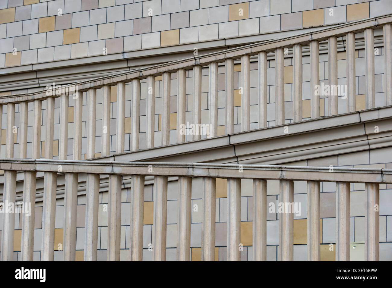 Modern building facade showcasing geometric patterns and architectural balustrade elements Stock Photo