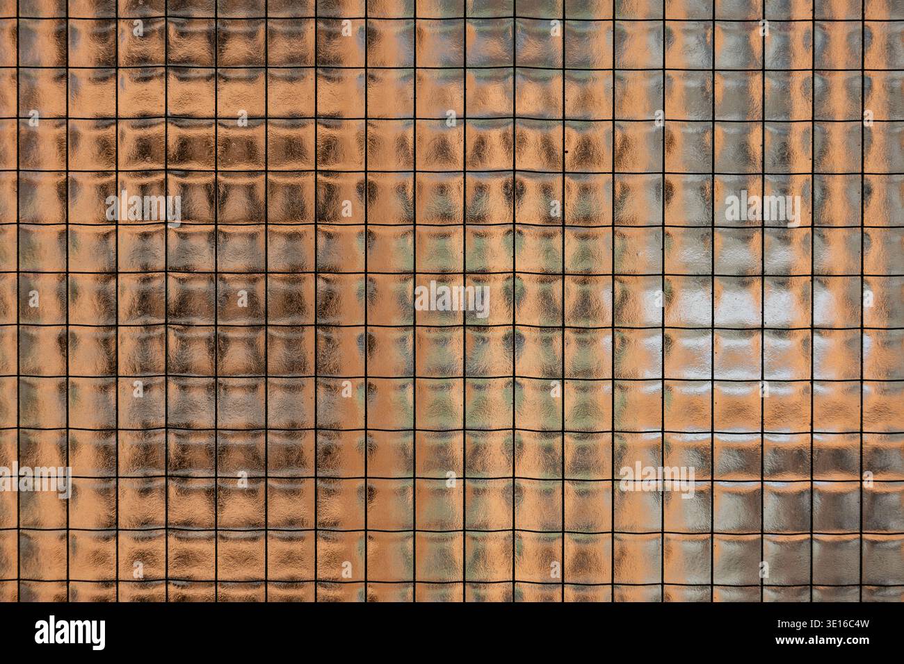 Textured wired glass surface creating abstract pattern with light and shadow reflections Stock Photo